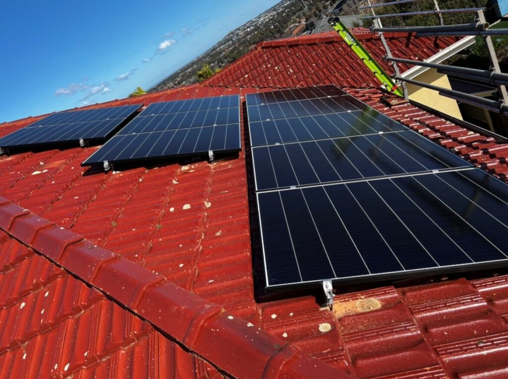 Older home getting solar panels installed.